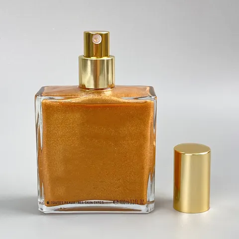 Gold body shimmer oil spray for private label manufacturing