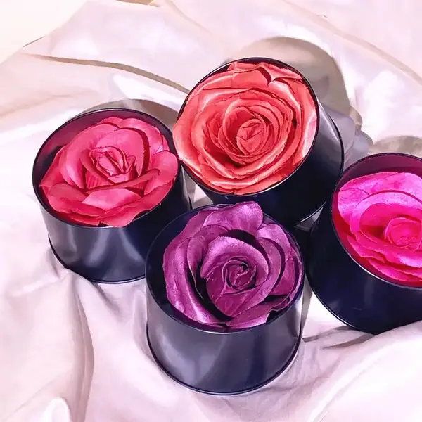 Rose-shaped blush products in pink and plum shades